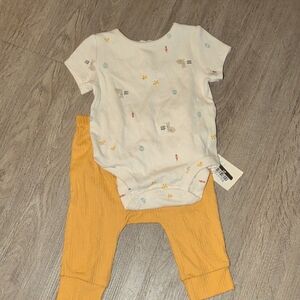 White Patterned Onesie with Yellow Pants